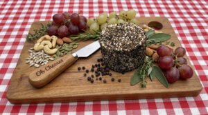Black Pepper Chevre – Tangy vegan goat-style cheese crusted in cracked black pepper by Oh Cheezes Bali